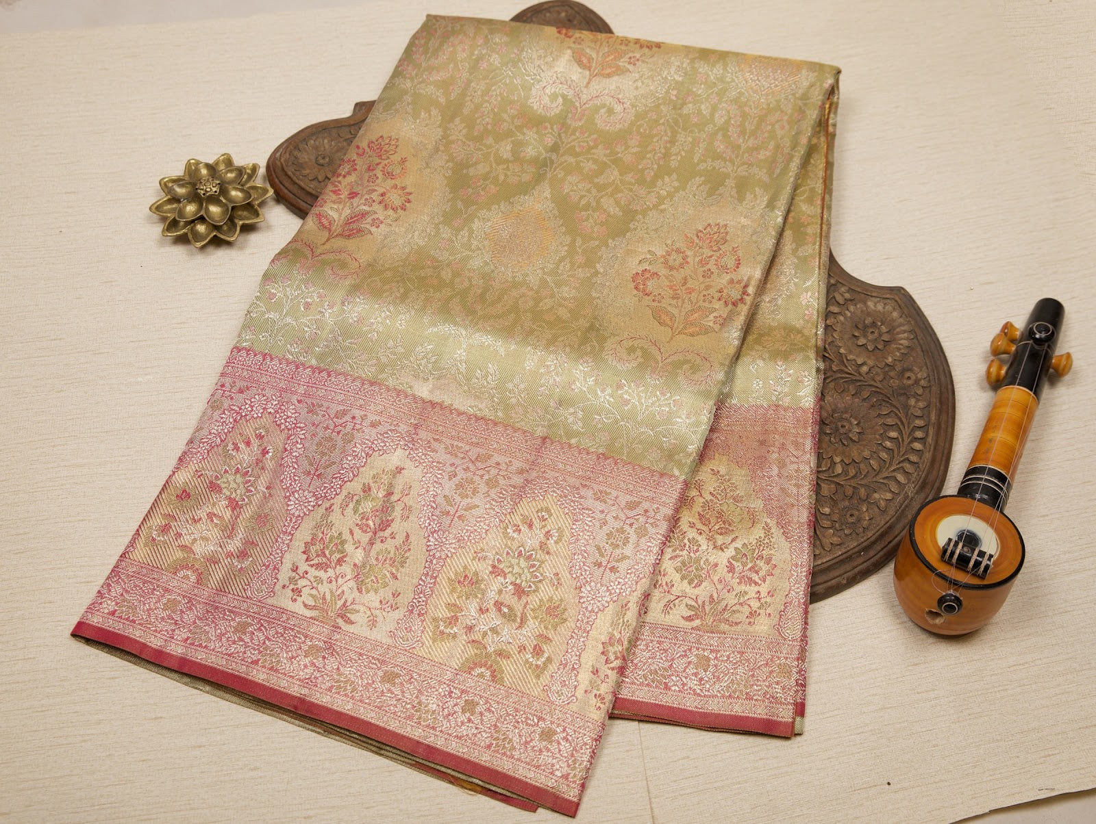 Light Green Kanjeevaram Tissue Silk Saree with Floral Zari Weave & Pink-Gold Broad Border