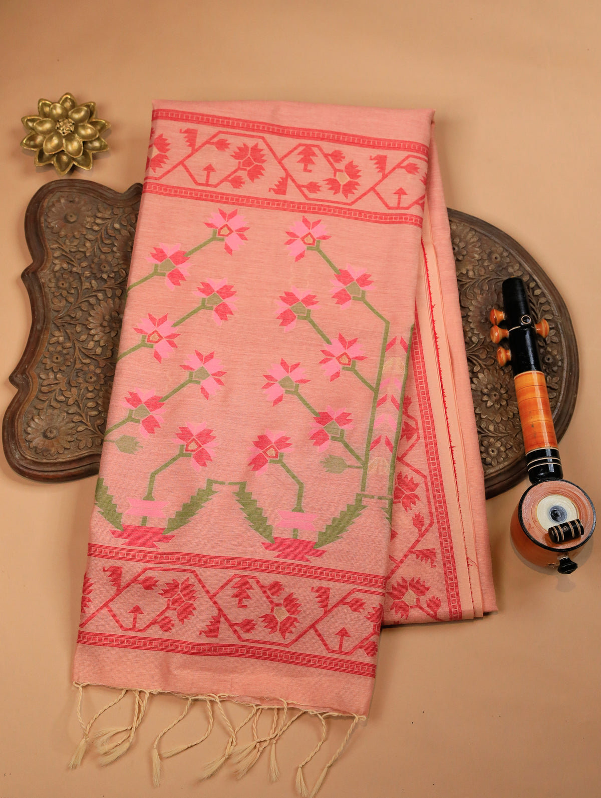 Peach Mulmul Cotton Saree with Buttas & Brick Red Floral Border