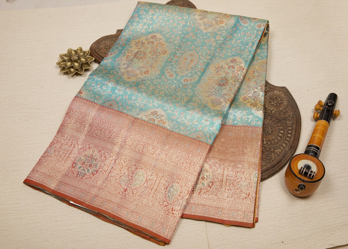 Teal Blue Kanjeevaram Tissue Silk Saree with Floral Zari Weave & Orange-Gold Broad Border