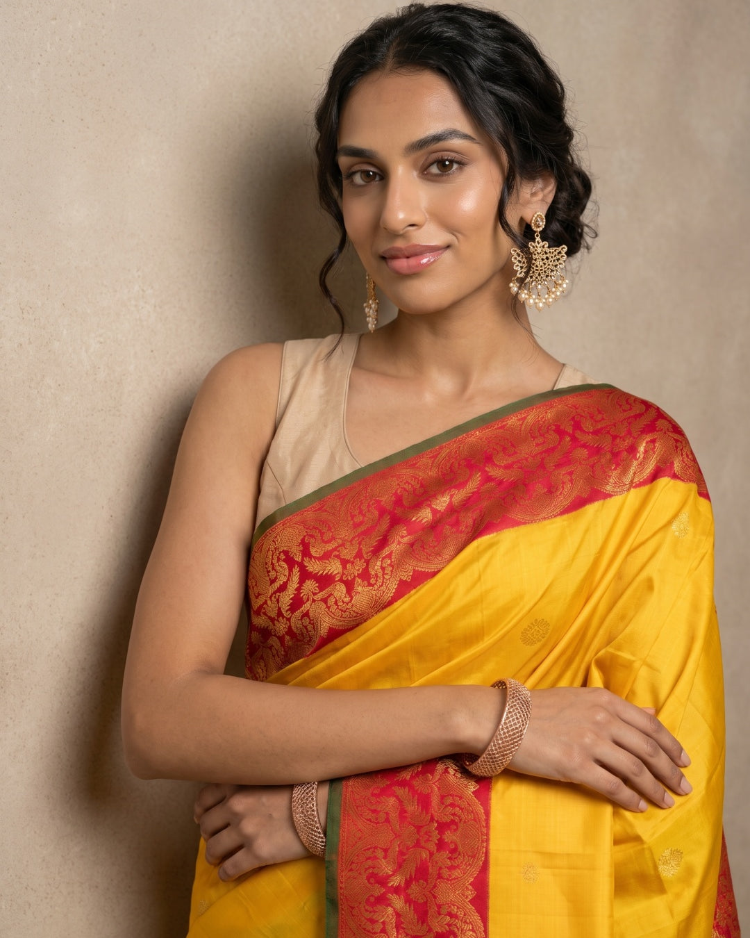 Yellow Pure Kanjeevaram Silk Saree with Gold Zari Motifs & Red Border