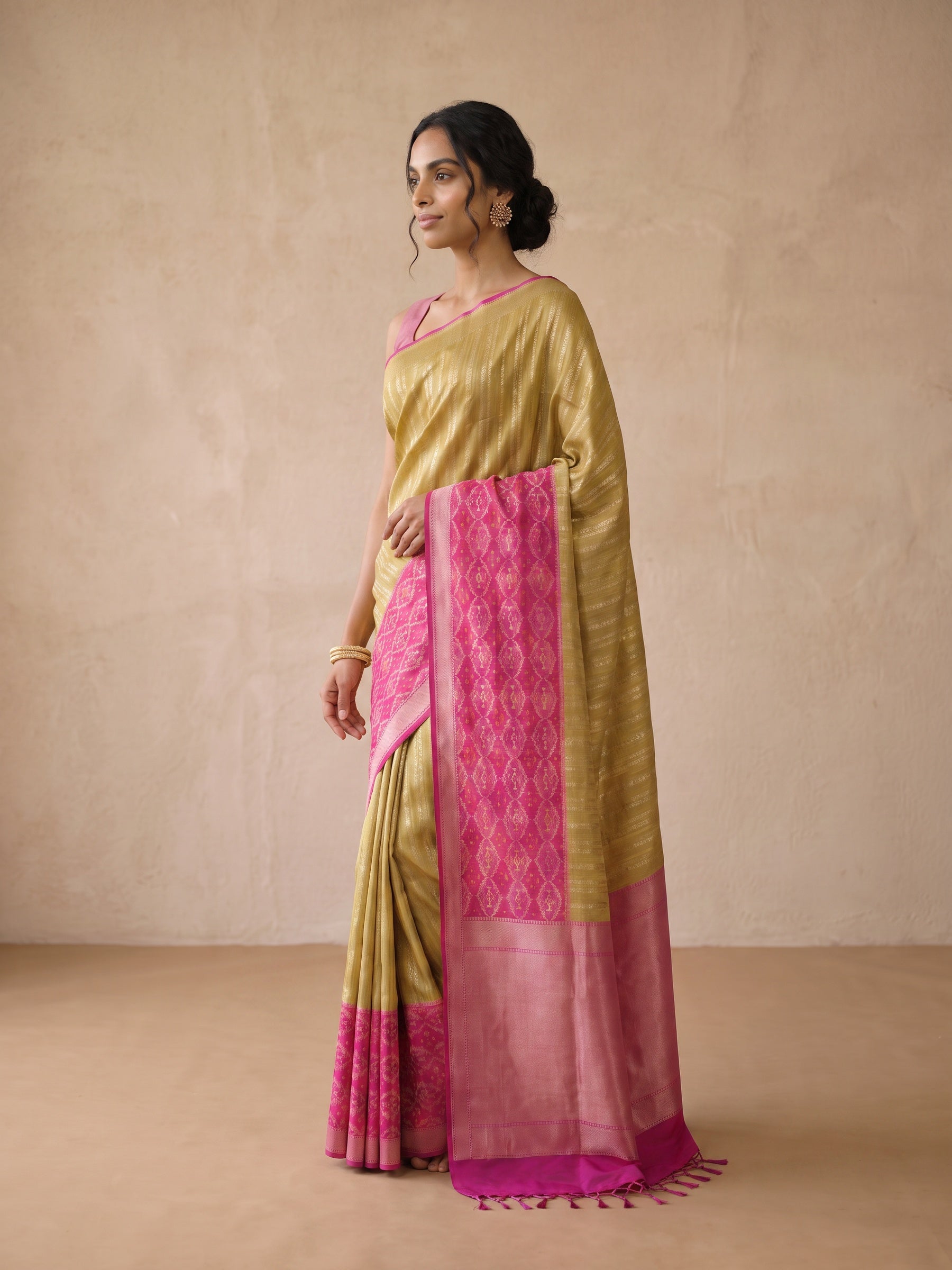 Olive Gold Patola Silk Saree - side standing