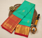 Green-Teal Dual-Tone Pure Kanjeevaram Silk Saree with Mango Motifs & Bright Pink Zari Border