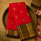 Bright Orange Kanjeevaram Silk Saree with Peacock Zari