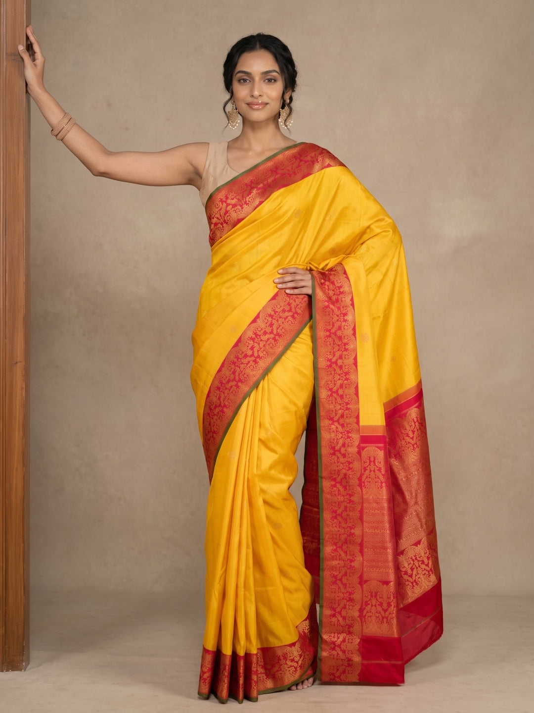 Yellow Pure Kanjeevaram Silk Saree with Gold Zari Motifs & Red Border - detail