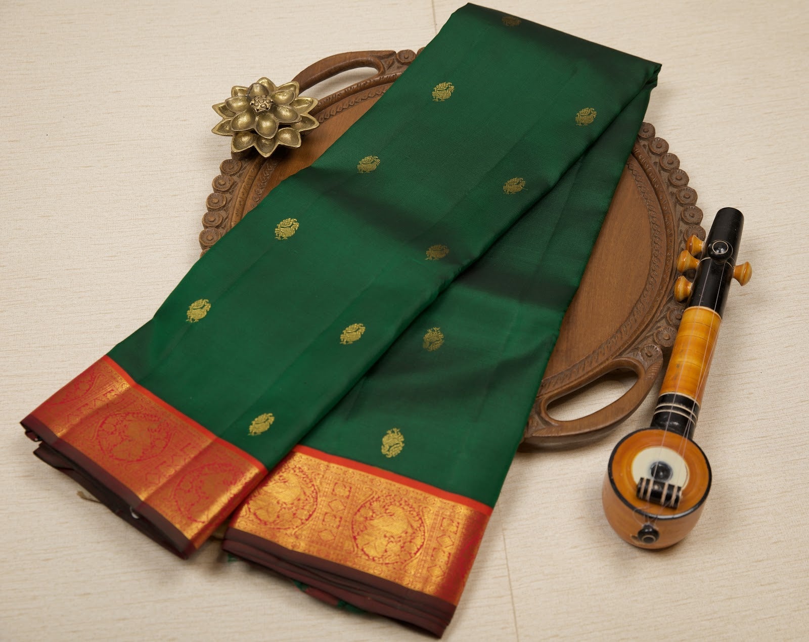 Dark Green Pure Handloom Kanjeevaram Silk Saree with Peacock Buttas & Orange Peacock Border