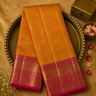 Mustard Orange Kanchivaram Pure Brocade Silk Saree with Rani Pink Floral Design