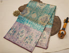 Peacock Green Kanjeevaram Tissue Silk Saree with Floral Zari Weave & Purple Floral Border