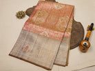 Light Green Kanjeevaram Tissue Silk Saree with Floral Zari Weave & Pink-Gold Broad Border