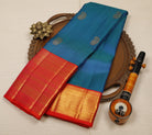 Peacock Green-Blue Dual-Tone Pure Kanjeevaram Silk Saree with Mango Motifs & Orange Zari Border