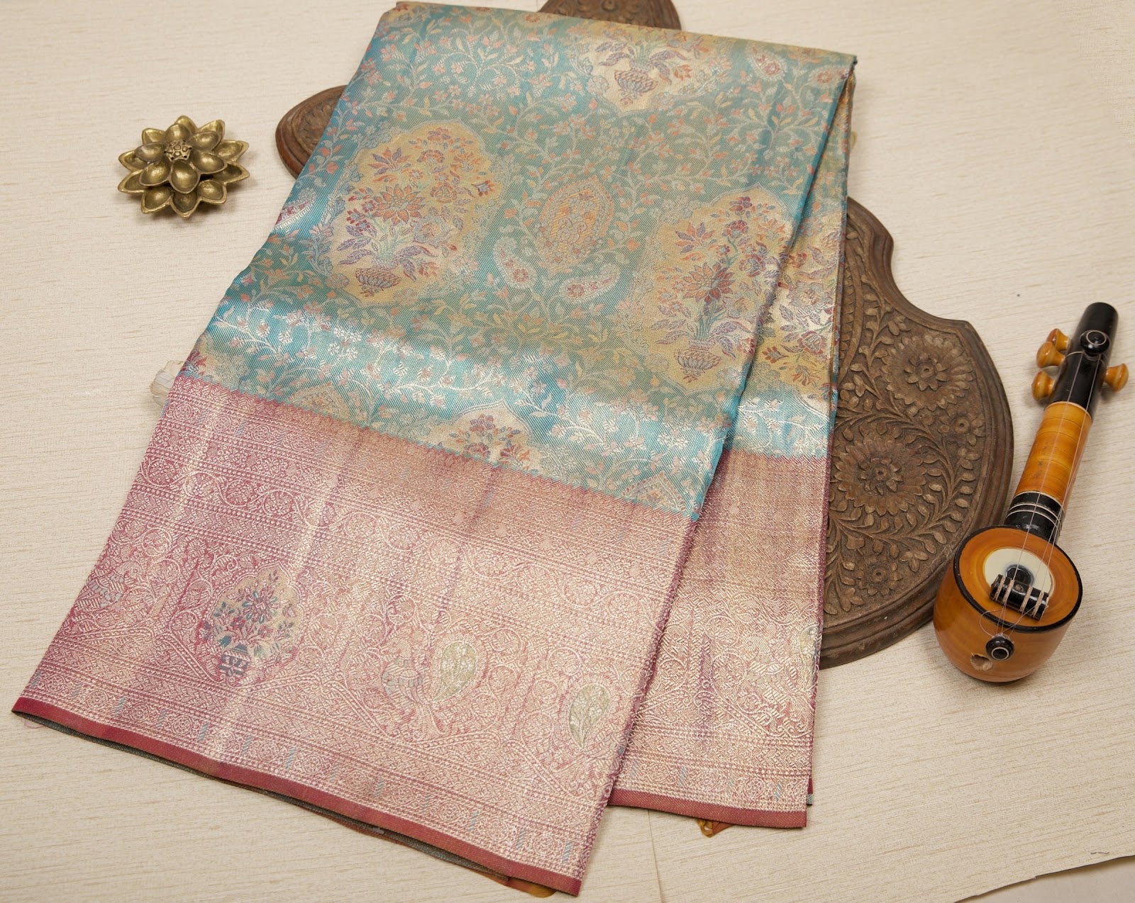 Teal Blue Kanjeevaram Tissue Silk Saree with Floral Zari Weave & Pink Floral Border