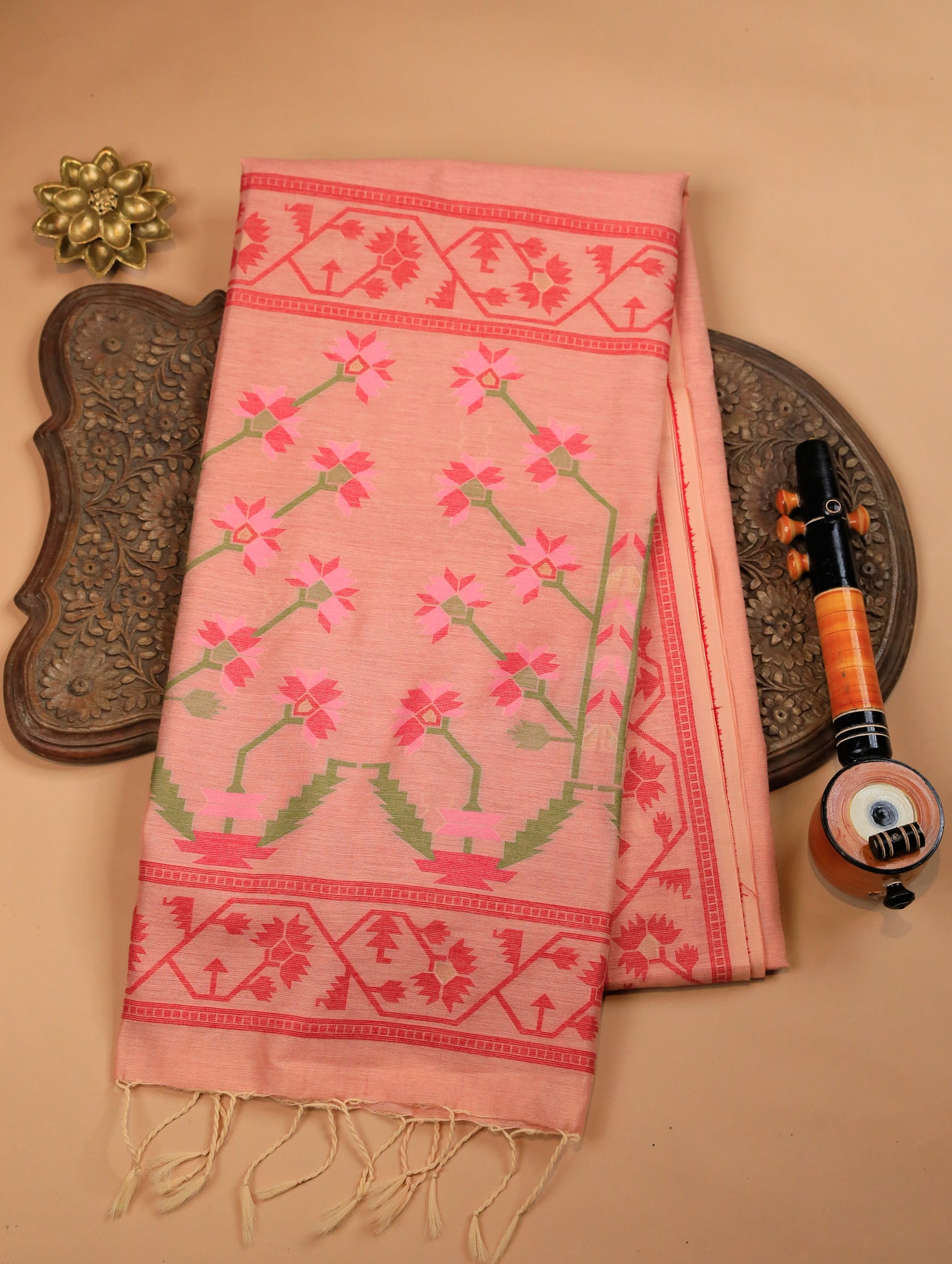 Peach Mulmul Cotton Saree with Buttas & Brick Red Floral Border