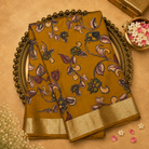 Mustard Yellow Semi Tussar Saree with Floral Print & Gold Zari Border