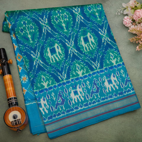Peacock Blue Ikat Silk Saree