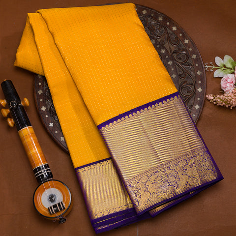 Bright yellow kanjeevaram silk saree