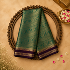 Green Semi Crepe Silk Saree with Gold Zari Weave, Purple-Gold Border & Purple Blouse