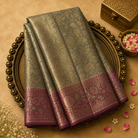 Pastel Green Semi Tissue Silk Saree with Floral Gold Zari & Pink Blouse