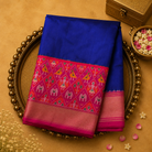 Dark Blue Ikat Saree with Animal Weave & Pink Border