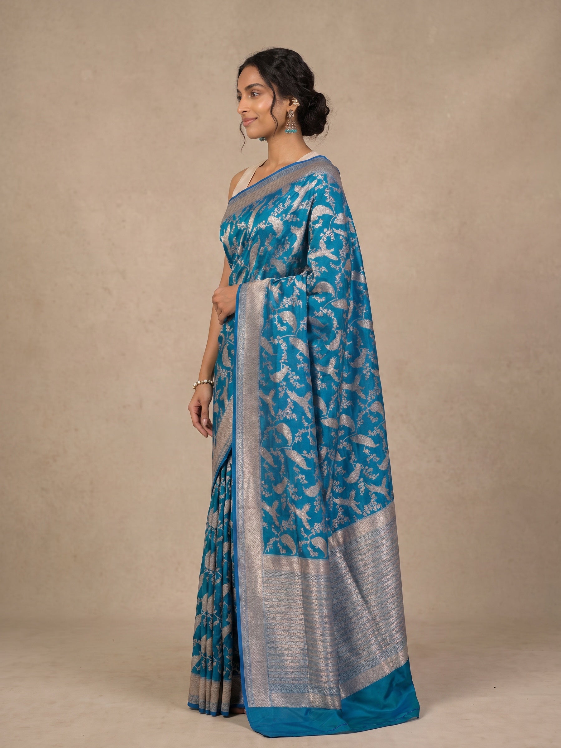 Peacock Blue Banaras Georgette Saree - side standing