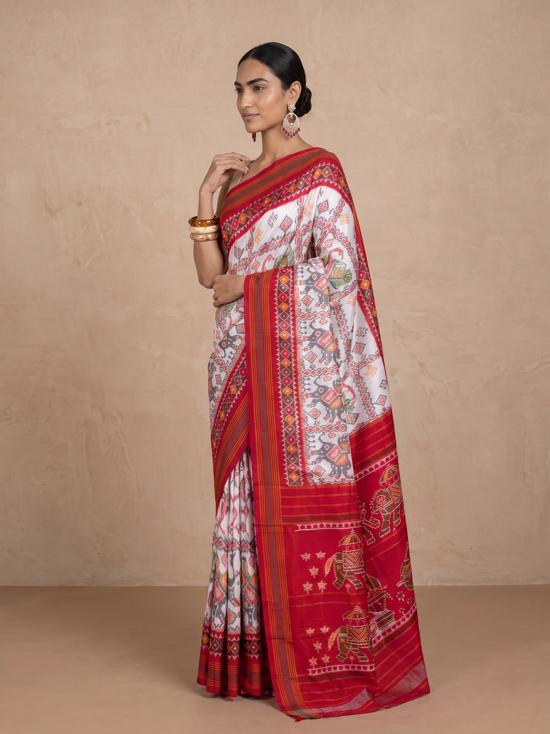 Ivory Patola Silk Saree - side standing