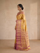 Golden Yellow Pure Kanjivaram Tissue Silk Saree - side standing