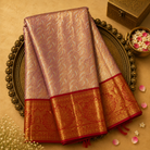 Light Pink Kanjeevaram Tissue Silk Saree with Zari Weave & Red-Gold Border