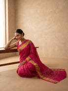 Neon Pink Ikat Silk Saree - seated pose