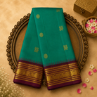 Green Kanjeevaram Silk Saree with Gold Zari Motifs & Magenta Blouse