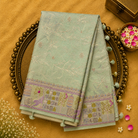 Light Pastel Green Tussar Silk Saree with White Embroidery & Animal Border