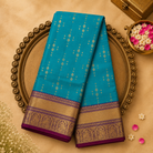 Blue Silk Saree with Gold Zari Buttas & Purple-Gold Border