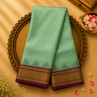 Light Teal Green Silk Saree with Gold Zari Buttas & Rani Pink-Gold Border
